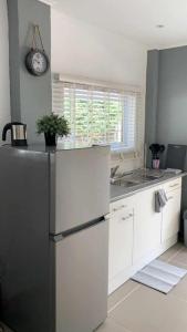 A kitchen or kitchenette at Apartment Curacao