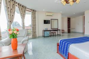 Μια τηλεόραση ή/και κέντρο ψυχαγωγίας στο Palmira Beach Resort & Spa