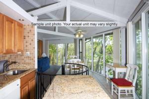 Galería fotográfica de Unit 29 - Treetop 2 Bedroom Villa en Four Seasons