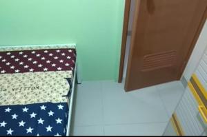 Letto o letti in una camera di Eiffel Residence Cideng - Female Only