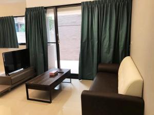 Posezení v ubytování Zhong Xing Lohas Homestay