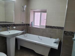 Kylpyhuone majoituspaikassa Sanaega Pension