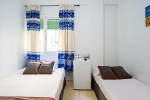 Postel nebo postele na pokoji v ubytování Pensión Ayuntamiento