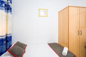 Postel nebo postele na pokoji v ubytování Pensión Ayuntamiento