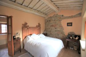 A bed or beds in a room at Antico Gelso