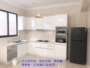 Nhà bếp/bếp nhỏ tại Zhong Xing Lohas Homestay