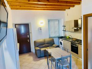 Kuchyň nebo kuchyňský kout v ubytování Conte Durini Apartments & Rooms