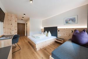 Voodi või voodid majutusasutuse Hotel Am Fels toas +31 fotot