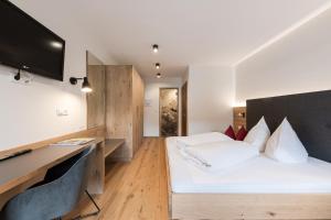 Voodi või voodid majutusasutuse Hotel Am Fels toas