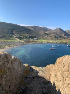 a large body of water with boats in it at Patmos Villas in Grikos