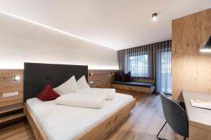 Voodi või voodid majutusasutuse Hotel Am Fels toas