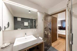 Vannituba majutusasutuses Hotel Am Fels
