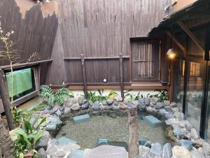 Zahrada ubytování Dormy Inn Akihabara
