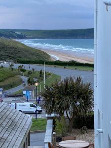 a view of the beach from the balcony of a house at Southover Beach in Woolacombe