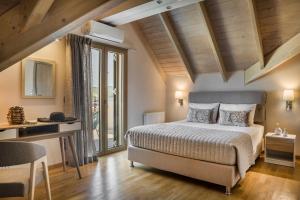 Posteľ alebo postele v izbe v ubytovaní Grand View Maisonette
