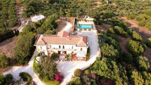 an aerial view of a house with a swimming pool at Casale Galati in Sciacca