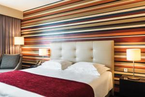 Giường trong phòng chung tại Hotel Trópico
