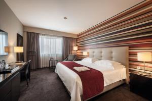 Giường trong phòng chung tại Hotel Trópico