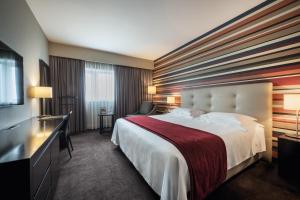 Giường trong phòng chung tại Hotel Trópico