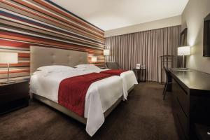 Giường trong phòng chung tại Hotel Trópico