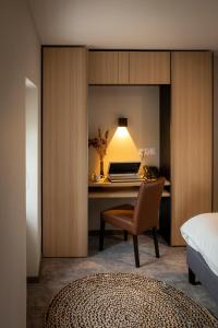 Postelja oz. postelje v sobi nastanitve Hotel - Restaurant Les 3 Piliers