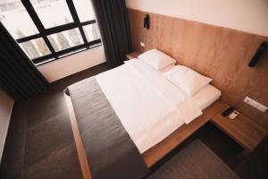 Postel nebo postele na pokoji v ubytování Sofia Hotel