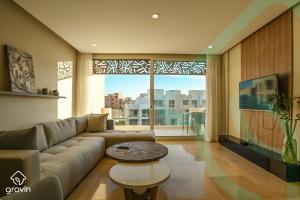 TV a/nebo společenská místnost v ubytování Mangroovy Residence El Gouna - Grovin
