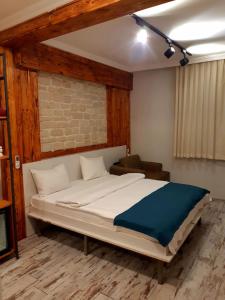 a bedroom with a large bed in a room at Hot Budget Ortakoy in Istanbul