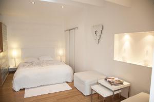Katil atau katil-katil dalam bilik di Chambres d'hôtes Home Sweet Home