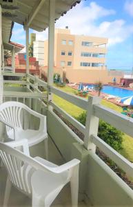 En balkon eller terrasse på Hotel Tejas Rojas