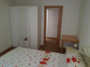 Posteľ alebo postele v izbe v ubytovaní Apartments Vila Tisa