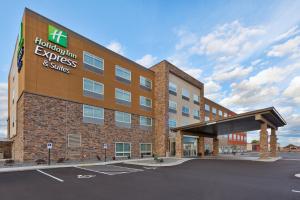 a rendering of a hotel with a large building at Holiday Inn Express- Eau Claire West I-94 by IHG in Eau Claire