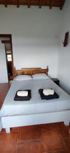 Postel nebo postele na pokoji v ubytování Casa da caldeira