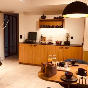 Kuchyň nebo kuchyňský kout v ubytování B&B Villa Mimosa