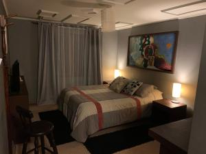 Postel nebo postele na pokoji v ubytování Hostal Boutique 180 Grados