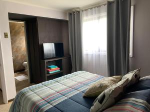 Voodi või voodid majutusasutuse Hostal Boutique 180 Grados toas