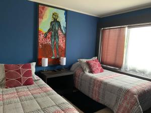 Voodi või voodid majutusasutuse Hostal Boutique 180 Grados toas