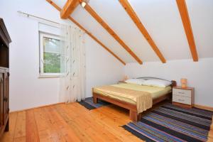 Posteľ alebo postele v izbe v ubytovaní Holiday Home Nevenka