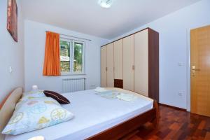 Posteľ alebo postele v izbe v ubytovaní Holiday Home Nevenka