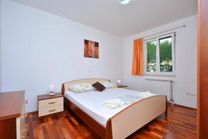 Posteľ alebo postele v izbe v ubytovaní Holiday Home Nevenka
