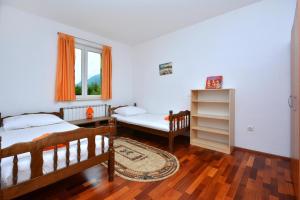 Posteľ alebo postele v izbe v ubytovaní Holiday Home Nevenka