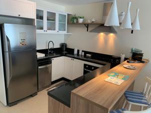 Køkken eller tekøkken på Alto Padrão Pé na Areia 2