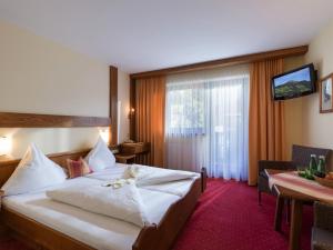 Ein Bett oder Betten in einem Zimmer der Unterkunft Pension Elisabeth