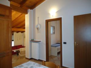 Postel nebo postele na pokoji v ubytování Casa Vittoria V1