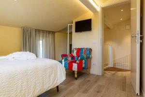 Posteľ alebo postele v izbe v ubytovaní Borgo Cantagallo Casa Ofelia