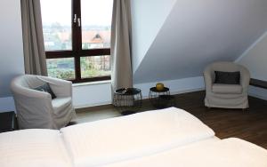 Postel nebo postele na pokoji v ubytování Hotel Victoria