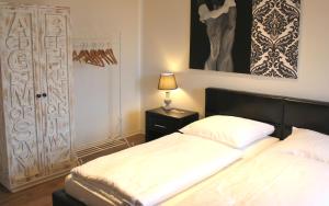 Postel nebo postele na pokoji v ubytování Hotel Victoria