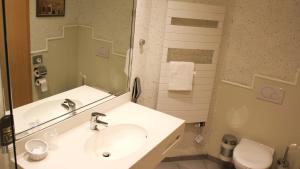 Koupelna v ubytování Hotel Victoria