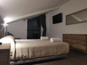 Postel nebo postele na pokoji v ubytování VILLA MAREL