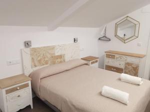 Postel nebo postele na pokoji v ubytování VILLA MAREL